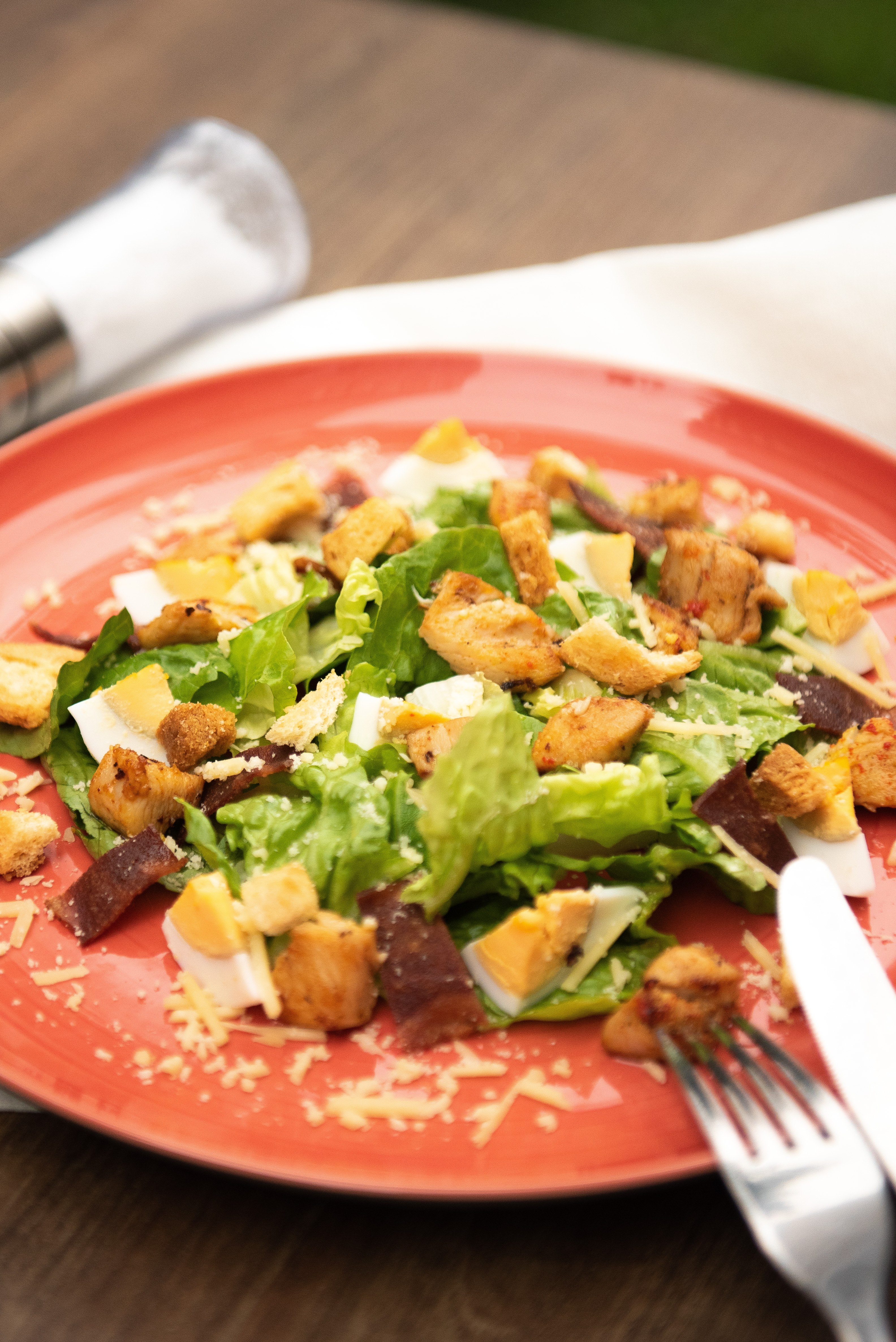Caesar salad with croutons and egg